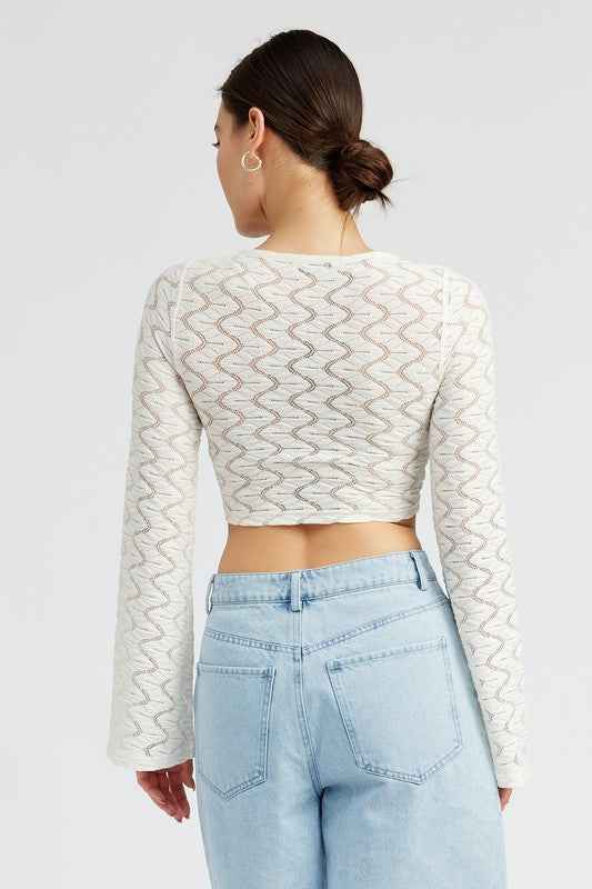 Emory Park crochet bell sleeve top with zigzag pattern and cropped design in light colors