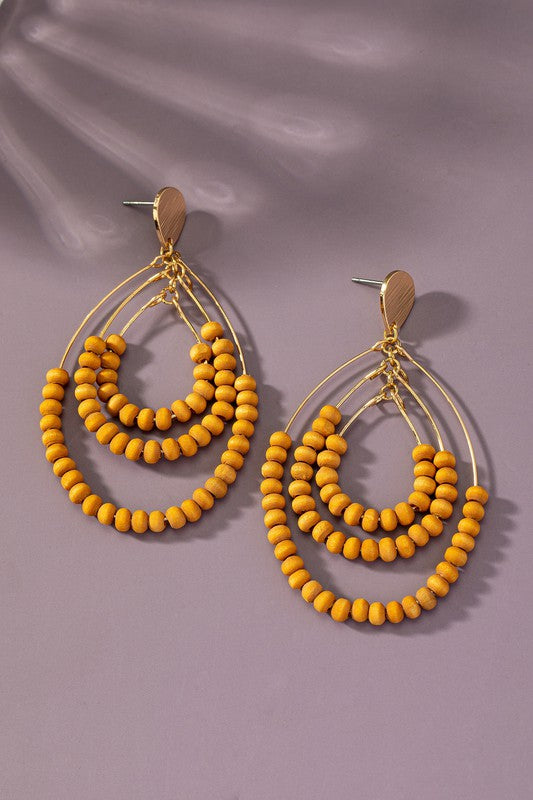 Three tier wood oval hoop earrings - Pikemla