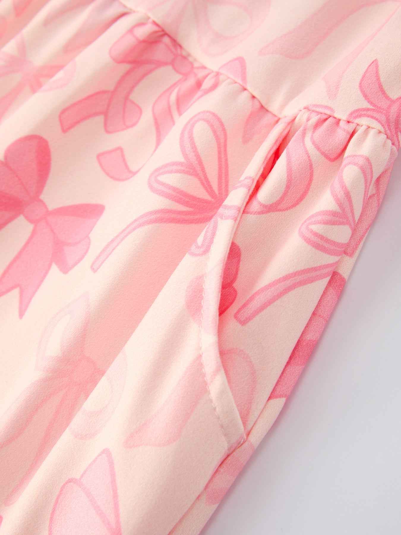 Girls Pink Bow Print Long Sleeve Jumpsuit