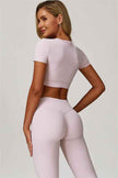 The Lavish Cut-out Crop Top Flared Leggings 2-Piece Set