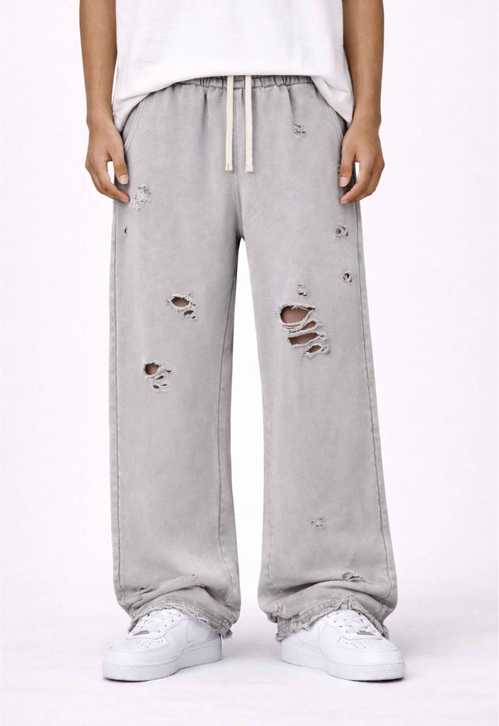GREY DESTROYED SWEATPANTS