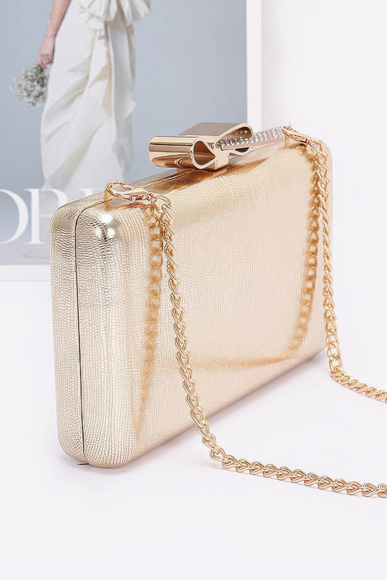 Metal Ribbon Top Case Clutch - Pikemla