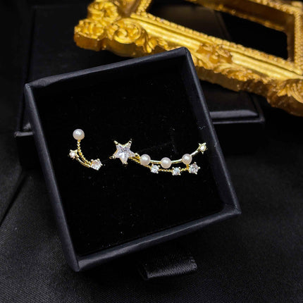 Mismatched Shooting Star Studs