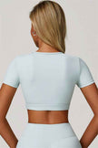 The Lavish Cut-out Crop Top Flared Leggings 2-Piece Set