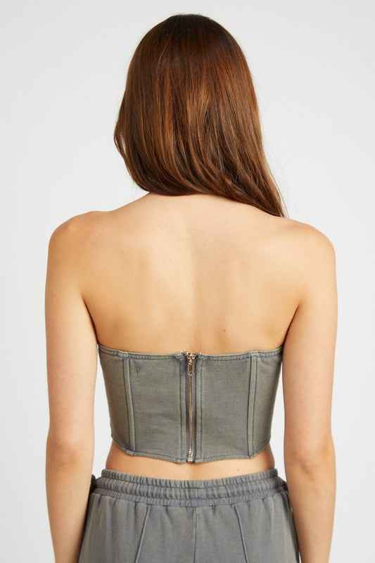 Back view of Emory Park French Terry Strapless Bustier Top in gray with a zipper closure