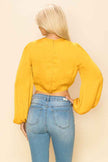 Long sleeve crop top with an open front design