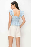 Flounced cap sleeves and hem floral print top