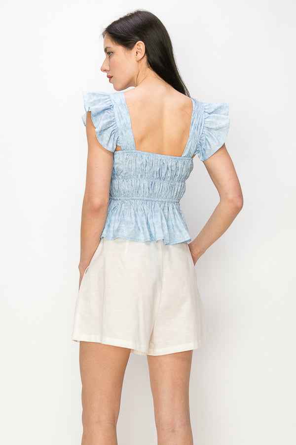 Flounced cap sleeves and hem floral print top