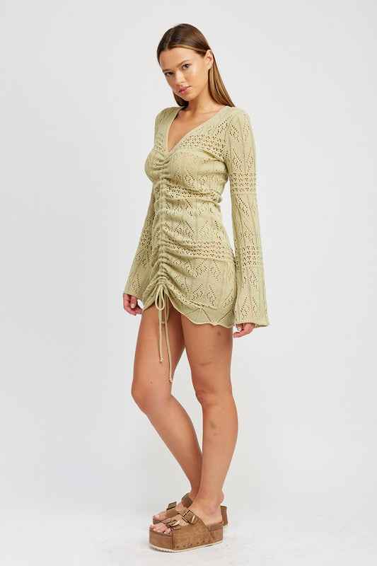 Emory Park ruched crochet mini dress in light green with long sleeves and adjustable drawstring detail