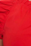 Solid Sleeveless Ruffle Trim Top