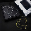 Twisted Heart Hoops Earrings