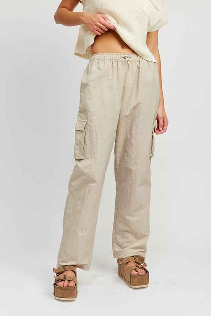 Emory Park beige straight leg pants with elastic waistband featuring cargo pockets for casual style