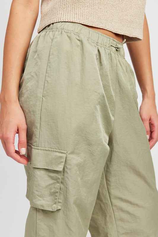 Emory Park straight leg pants with elastic waistband in light green, featuring side cargo pockets