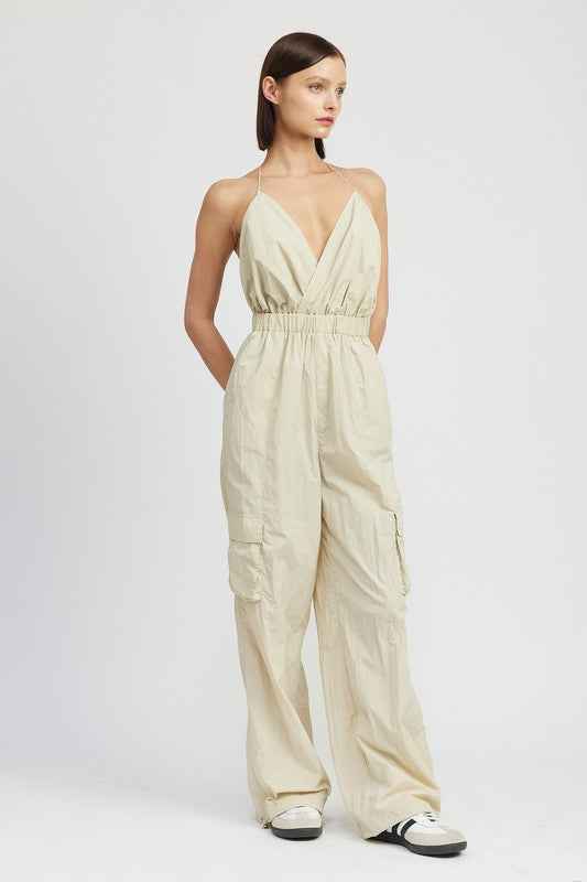 Emory Park women's cargo jumpsuit in beige with a halter neck and elastic waistband for a relaxed fit