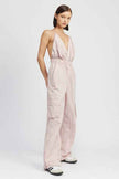 Emory Park women's cargo jumpsuit in soft pink with a halter neck design and relaxed fit