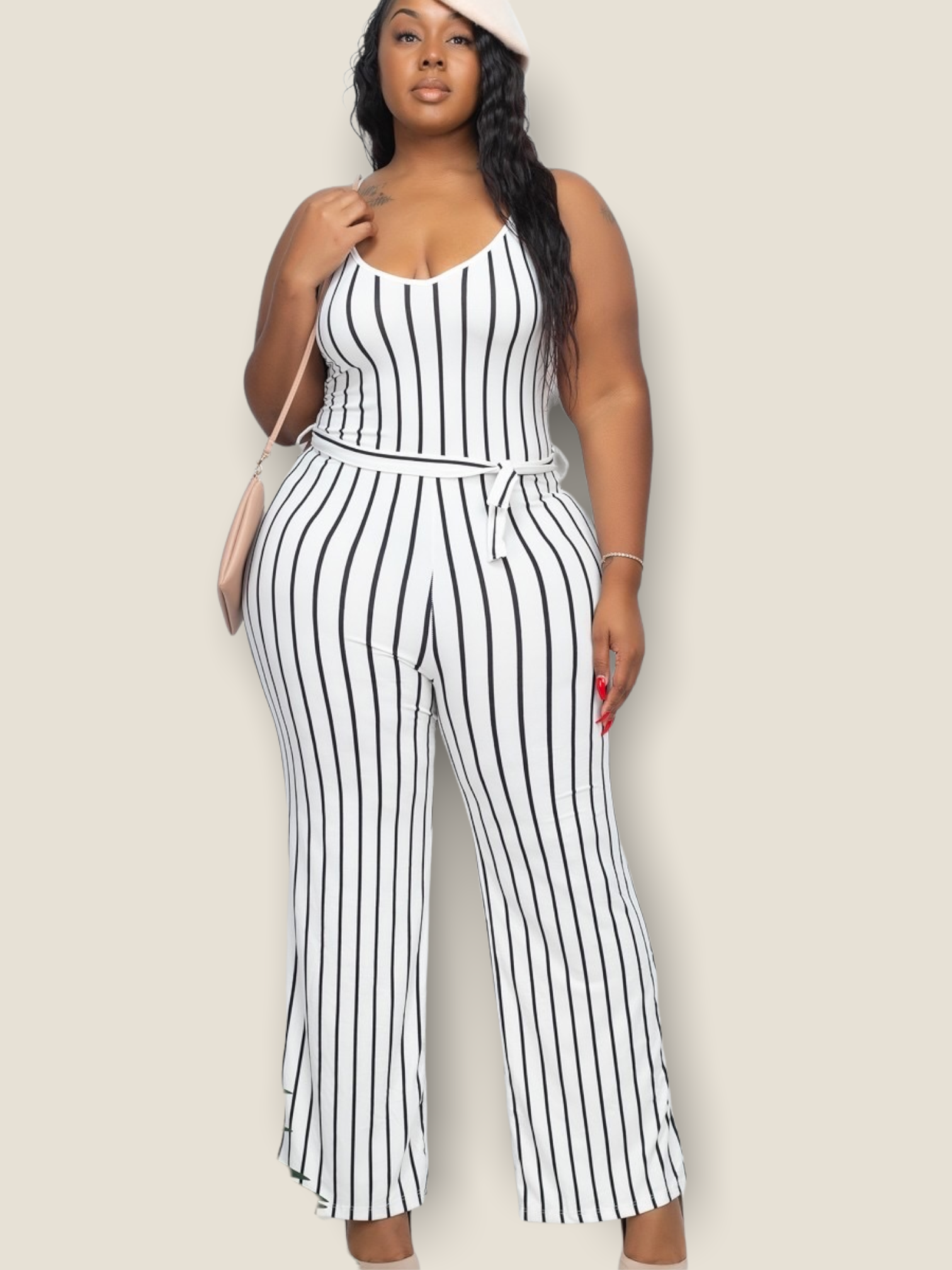 Plus size white striped jumpsuit with a fitted bodice and wide-leg style from Pikemla