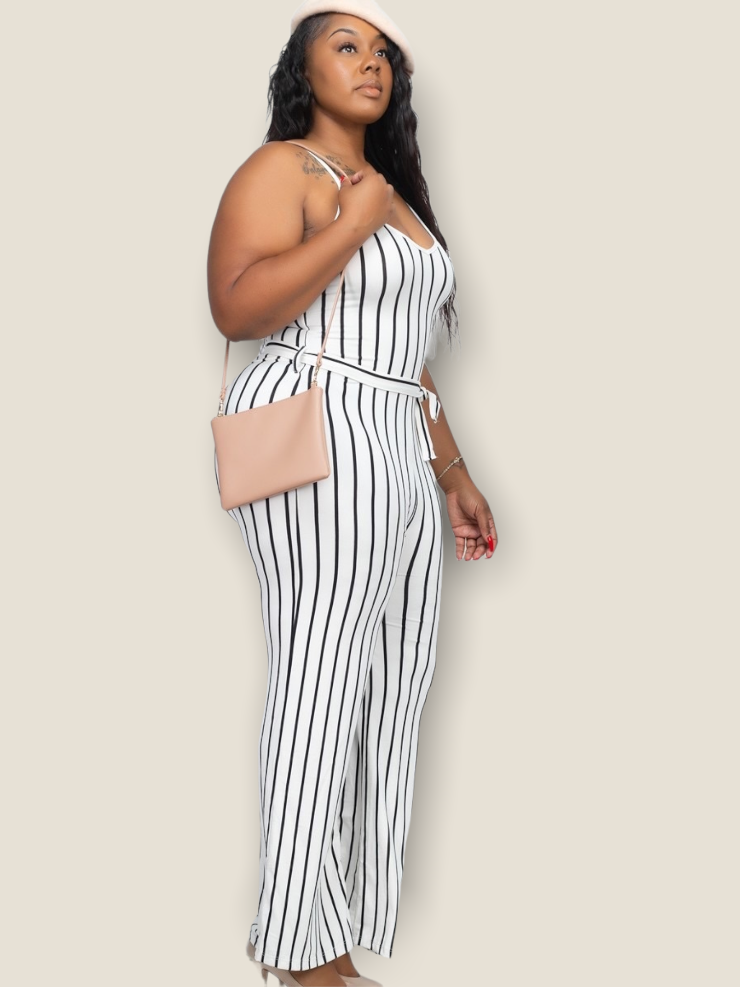 Pikemla plus size white striped jumpsuit with adjustable straps and a stylish fit