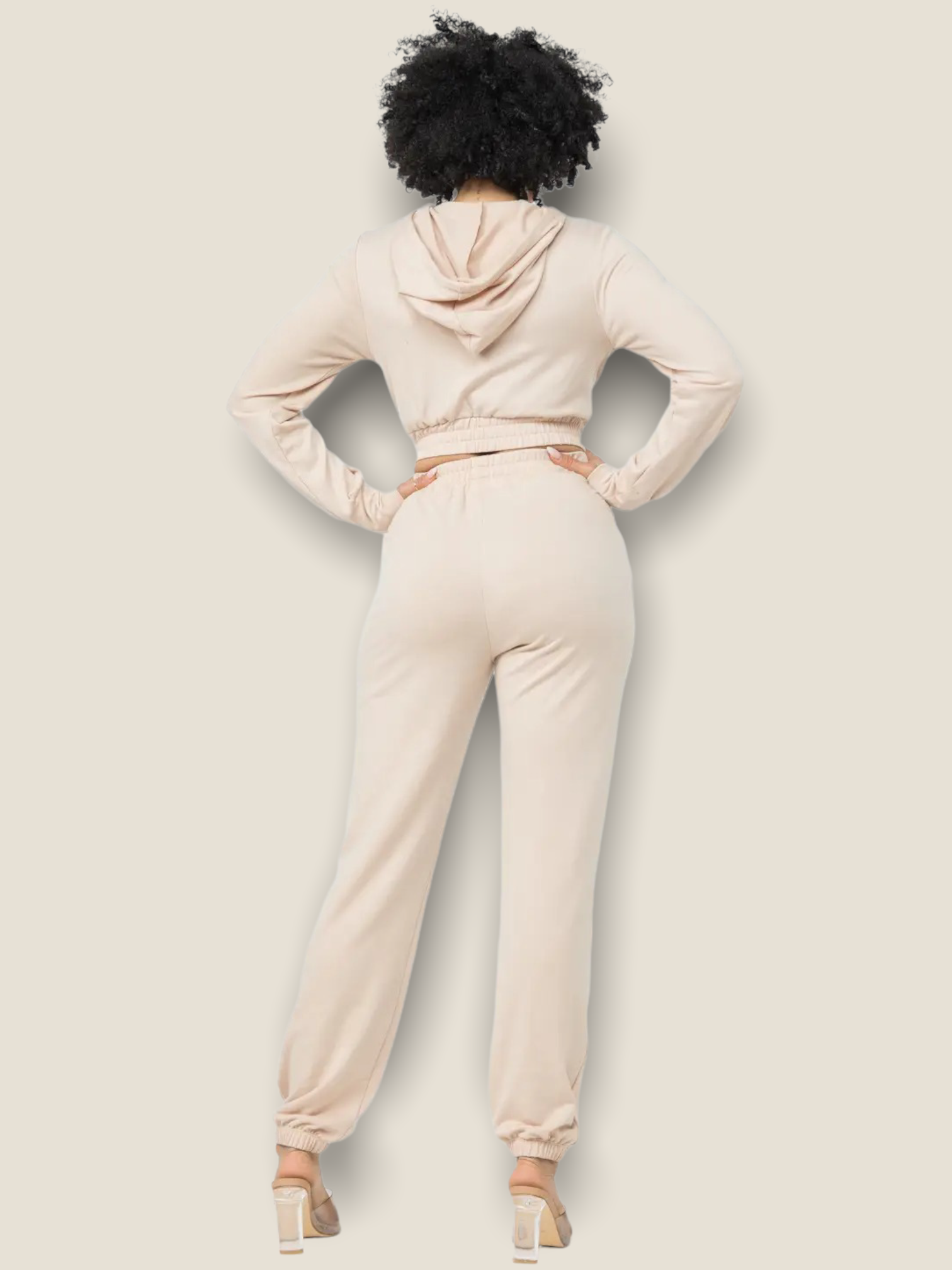 Back view of women's oatmeal jogger set featuring a cropped hoodie and slim joggers for a stylish look